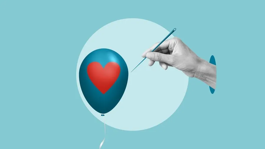 Mano che avvicina un ago a un palloncino con un cuore rosso, simbolo della fragilità emotiva degli adolescenti e del rischio di spezzarsi sotto la pressione.